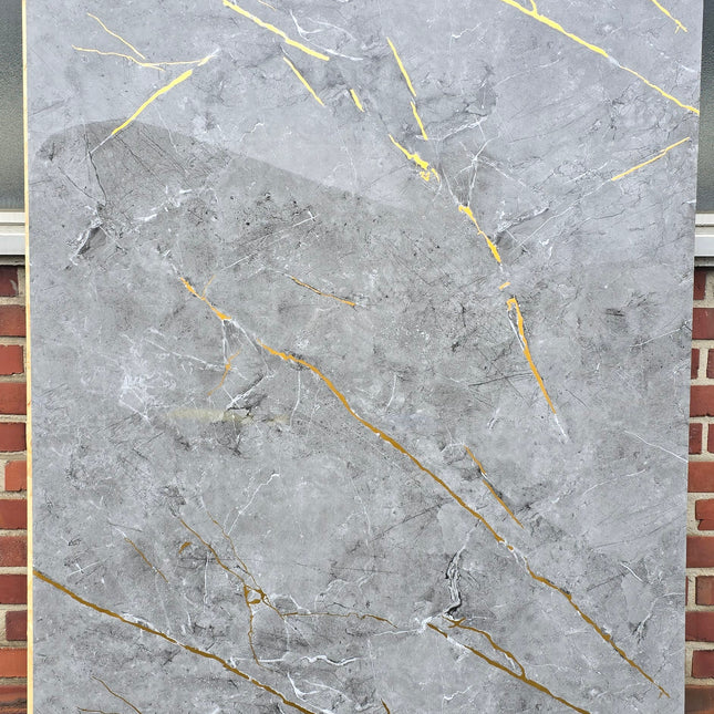 Elegant Grau-Gold - PVC Wandpaneel in Marmoroptik
122x260x0.3cm